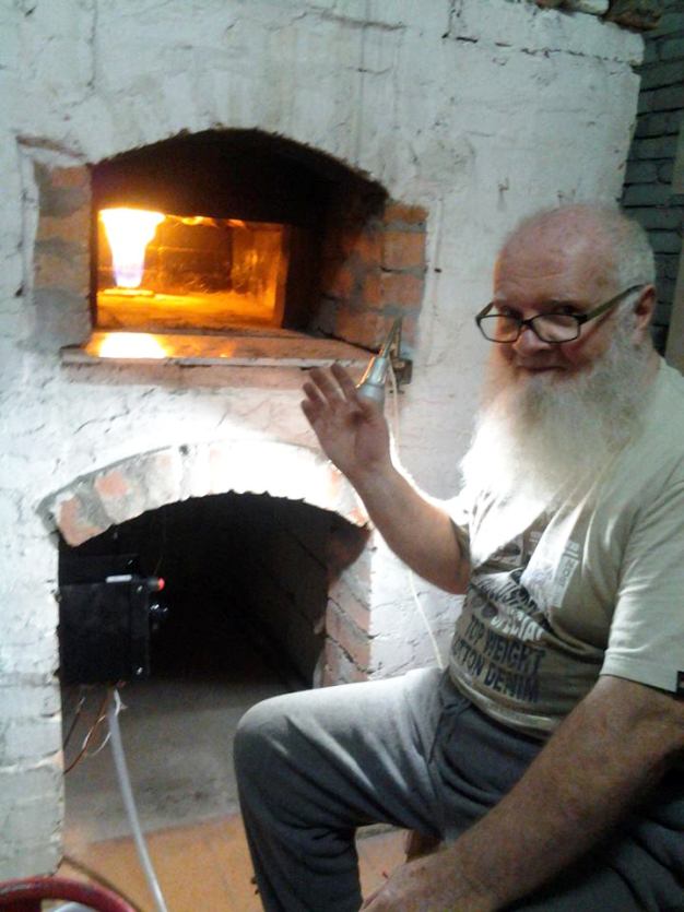 Martin proud of the woodfire oven he built himself